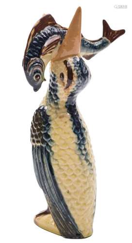 An Alexander Lauder (Barnstaple) pottery Bittern vase: modelled standing with a fish in its mouth