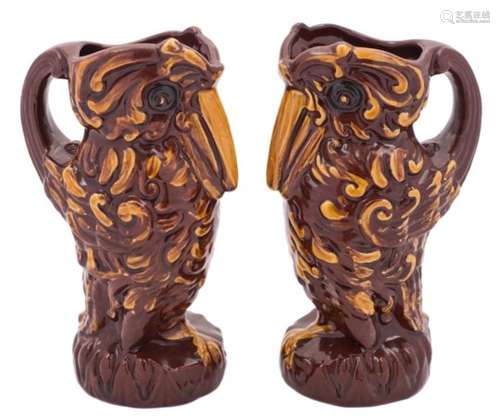 A pair of Longpark (Torquay) grotesque bird jugs: modelled standing with beak on chest,