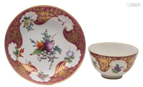 A First Period Worcester teabowl and saucer: painted in 'Hope Edwards' style with a bunch and