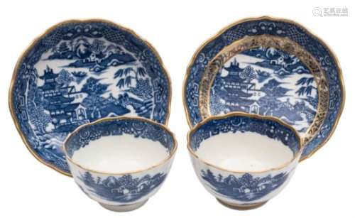 A pair of Caughley blue and white tea bowls and saucers: printed and gilded with the 'Pagoda'