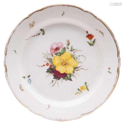 A Coalport plate painted by Thomas Pardoe at Bristol: painted with a floral spray and sprigs and