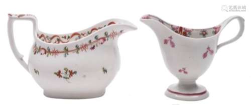 A Newhall famille rose hardpaste cream jug and one similar: the first of pedestal helmet shape,