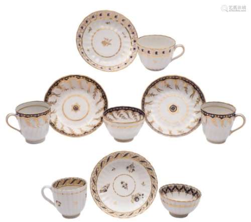 A group of New Hall hardpaste spiral fluted and reeded tea and coffee wares: painted and gilded