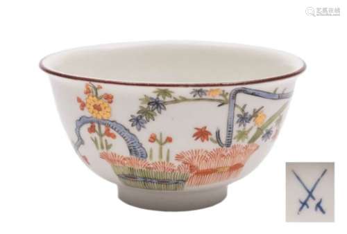 An early Meissen kakiemon teabowl: painted with a banded hedge and the 'Three Friends' of pine,