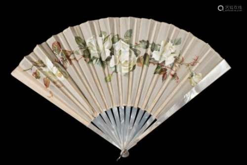 A late Victorian mother-of-pearl and silk fan: the painted silk leaf decorated with roses and