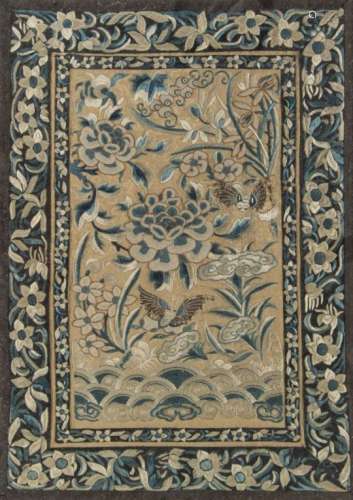 A Chinese silk embroidered rectangular panel: worked with butterflies amongst peony, lingzhi,