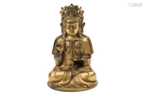 A gilt bronze Bodhisattva: seated cross-legged, his hands formed in vitarka mudra