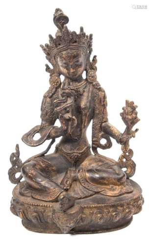 A Sino-Tibetan bronze figure of Buddha: holding two lotus flowers,