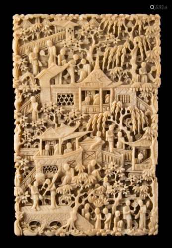 A late 19th century Cantonese ivory card case: decorated with figures in a pagoda landscape 10.5cm.