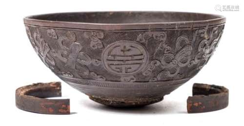 A 19th century Chinese carved coconut bowl: of circular outline,