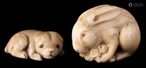 A Japanese carved ivory netsuke: of a rabbit or hare eating lettuce, signed, 4cm.