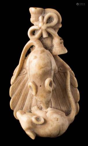 A Japanese carved ivory netsuke: of two rats standing on the back of a mirror, unsigned, 7cm. long.