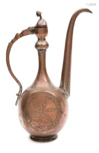 A Turkish Ottoman tinned copper ewer: with long slender spout,