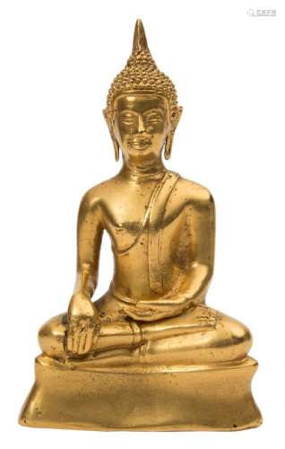 A gilt bronze figure of buddha shakyamuni: seated cross-legged,