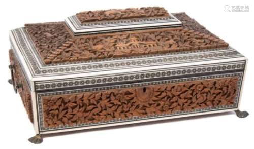 An Indian sadeli ware and carved wood work box: of sarcophagus outline,