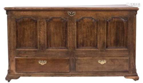 An 18th Century oak rectangular dower chest:, with a hinged moulded top,