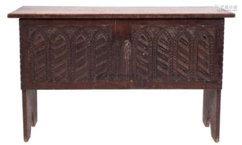 An 18th century oak rectangular plank coffer,