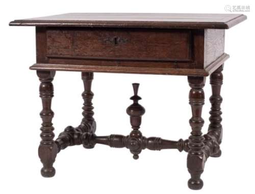 A 17th/18th Century French oak rectangular side table:, the top with a moulded edge,