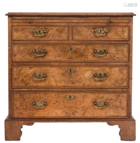 A walnut veneer and feather banded rectangular chest: of small size in the early 18th Century taste,