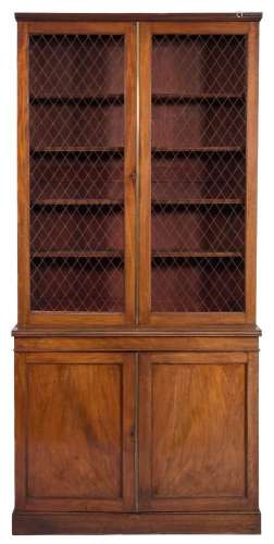 An early 19th century mahogany bookcase,