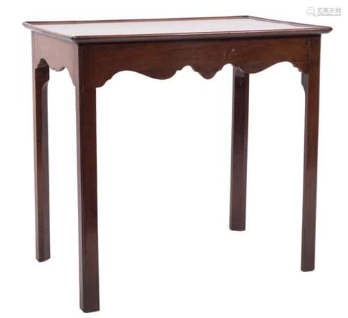 A George III mahogany rectangular silver table:, with a moulded top and shaped apron sides,