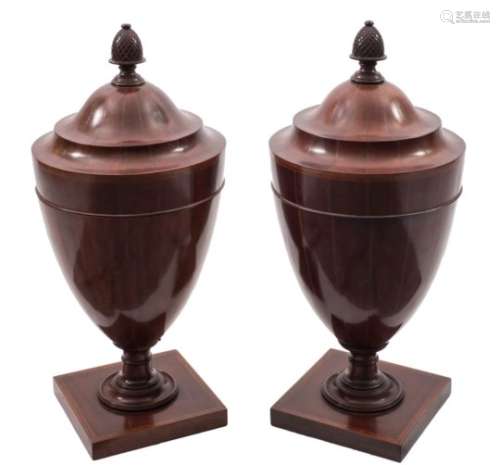 A pair of late 19th Century mahogany and inlaid cutlery urns in the Neo Classical taste:,