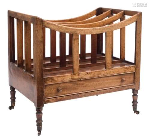 An early 19th Century mahogany three division canterbury:, with slatted uprights,