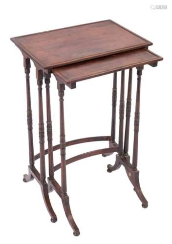 A nest of two Regency mahogany occasional tables:, with rectangular tops on ring turned uprights,