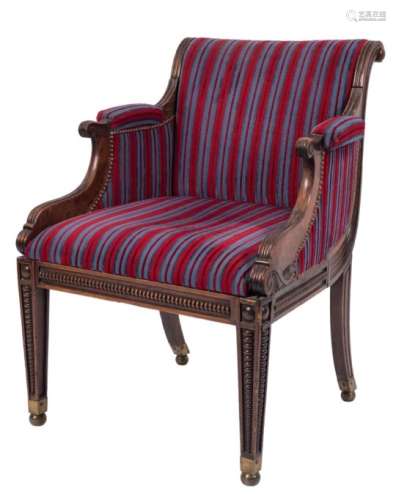 A Regency carved beech and simulated rosewood armchair:, with upholstered curved back,