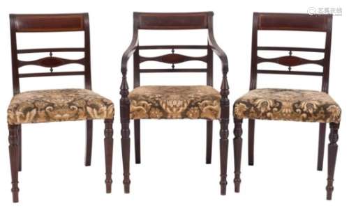 A set of eight Regency mahogany and inlaid dining chairs:, bordered with boxwood lines,