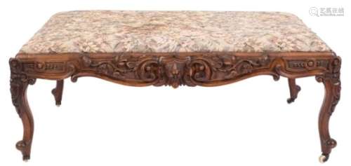 A Victorian carved walnut rectangular stool of large size:,