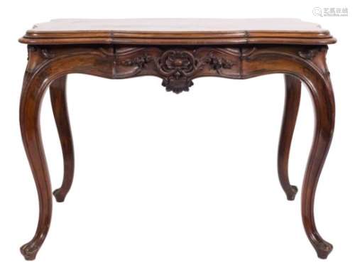A Victorian walnut serpentine centre table,: the top with a moulded edge,