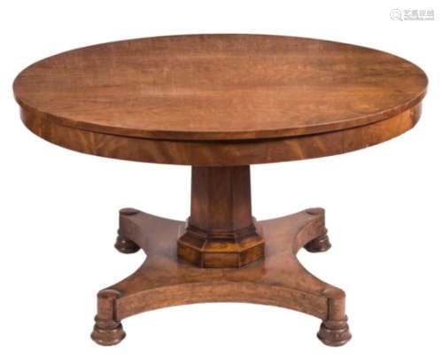A Victorian mahogany circular breakfast table:, the flame figured snap top on polygonal column,