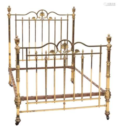 A Victorian brass double bed,