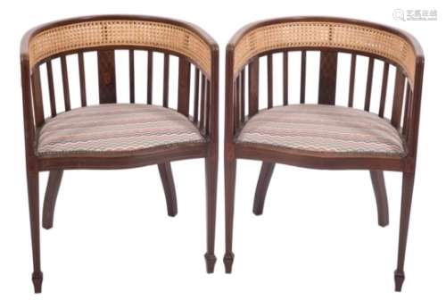 A pair of Edwardian mahogany and inlaid tub shaped occasional armchairs: bordered with boxwood
