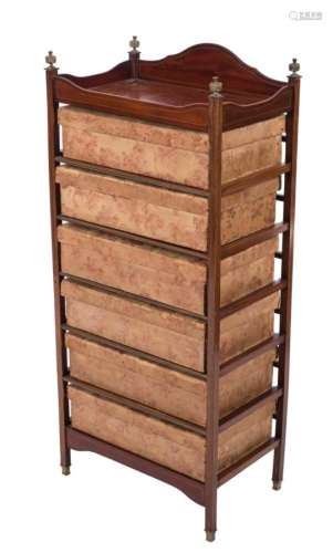 An unusual Edwardian mahogany and brass inlaid six tier upright chest:, bordered with lines,