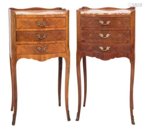A French walnut, beechwood and inlaid serpentine fronted petit commode:,