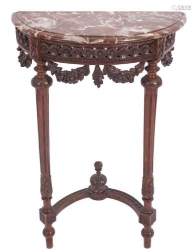 A French carved walnut demi lune pier table:, with a rouge variegated moulded marble top,