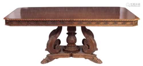 A 19th Century Indian carved hardwood rectangular dining table:, of large size,