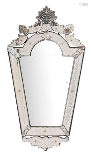 A Venetian etched marginal wall mirror:, of tapered form with foliate cresting,