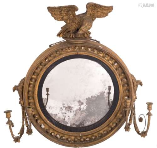A Regency carved giltwood and gesso circular convex girandole mirror:,