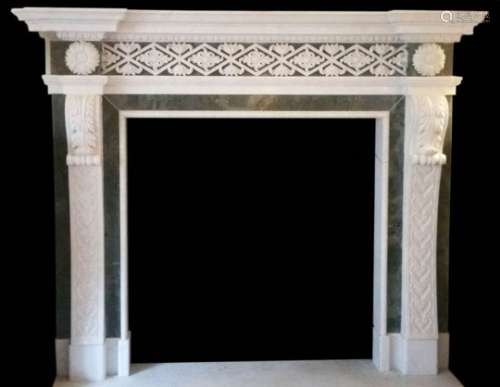 A carved white marble and Verde Antico fireplace in the Adam taste,