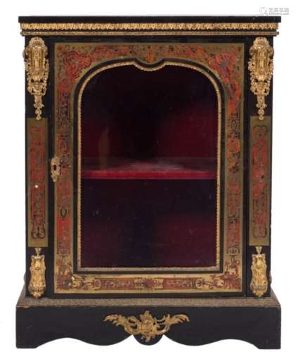 A 19th Century French ebonised and gilt metal mounted pier cabinet:,