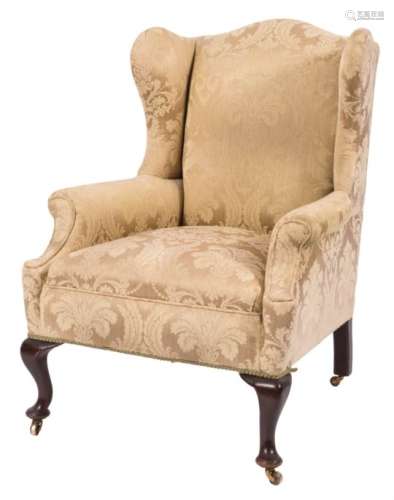 A mahogany wing frame armchair in the Queen Anne taste:,