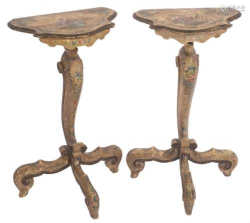 A pair of Continental carved and cream decorated console tables,
