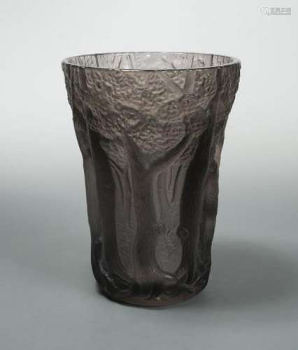 An early 20th century moulded amethyst glass vase,