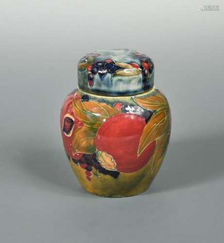 A small early Moorcroft Pomegranate pattern jar and