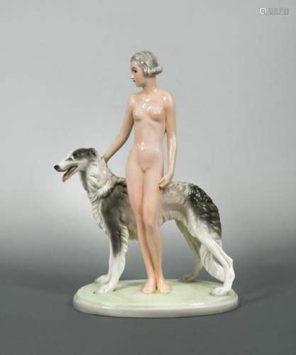 A Joesef Schuster model of a female nude with a Borzoi,