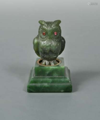 A jade and gem-set model of an owl in the manner of