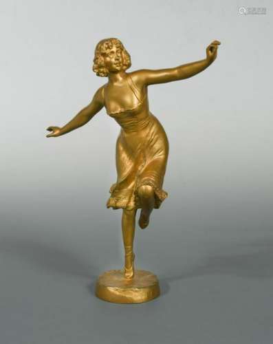 An Art Deco gilt bronze model of a dancer, signed F.